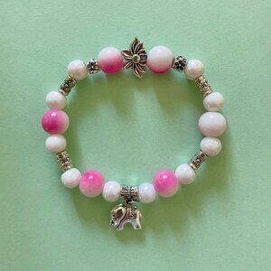Handmade bracelet with beads and dangling elephant charm